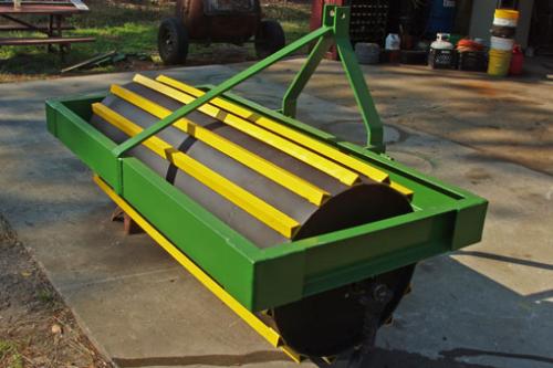 University of Florida roller crimper. Roller crimpers terminate the crop by crimping the stems, thus interrupting the flow of nutrients and water through the plant. This system allows the plant residue to remain on the soil surface. 